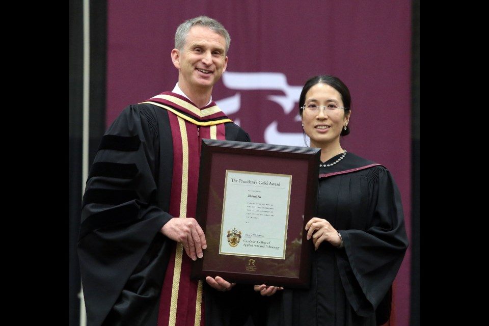 Zhihui (Elaine) Fu is a graduate of the Civil Engineering Technology program and is a dedicated student, outstanding ambassador, and tireless volunteer, earning her the President's Gold Award, presented by Bill Best, president, Cambrian College. (Supplied)