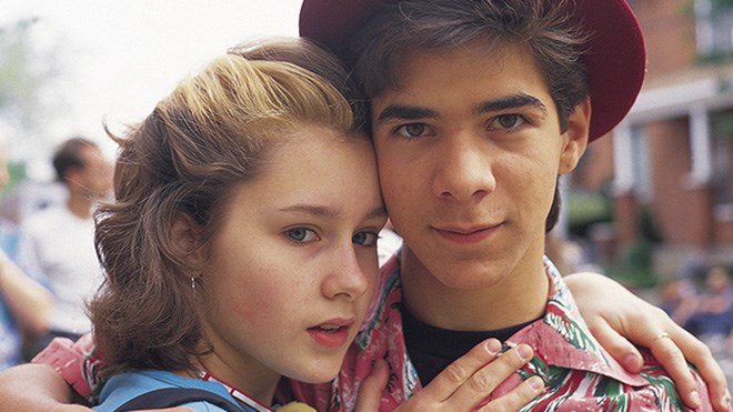Stacie Mistysyn (left) is best known for her role as Caitlin Ryan on Degrassi Junior High and Degrassi High. She's seen here with her on-screen boyfriend, Pat Mastroianni (who played Joey Jeremiah). (Supplied)