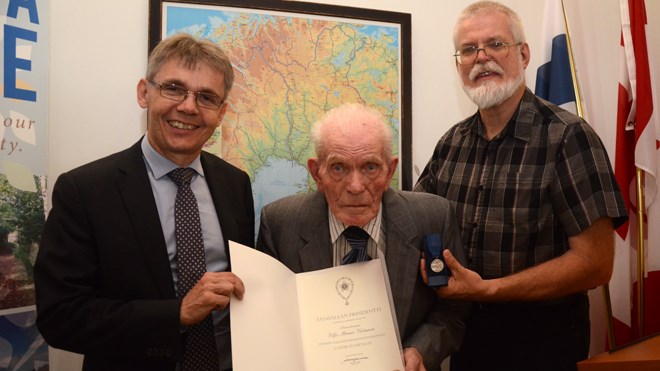 Finlandia Village resident Viljo Virtanen, a Finnish war veteran, was presented with the First Class medal of the Order of the White Rose by Vesa Lehtonen, Finnish ambassador to Canada. Virtanen's youngest son, Ray, is also pictured. (Arron Pickard/Sudbury.com)