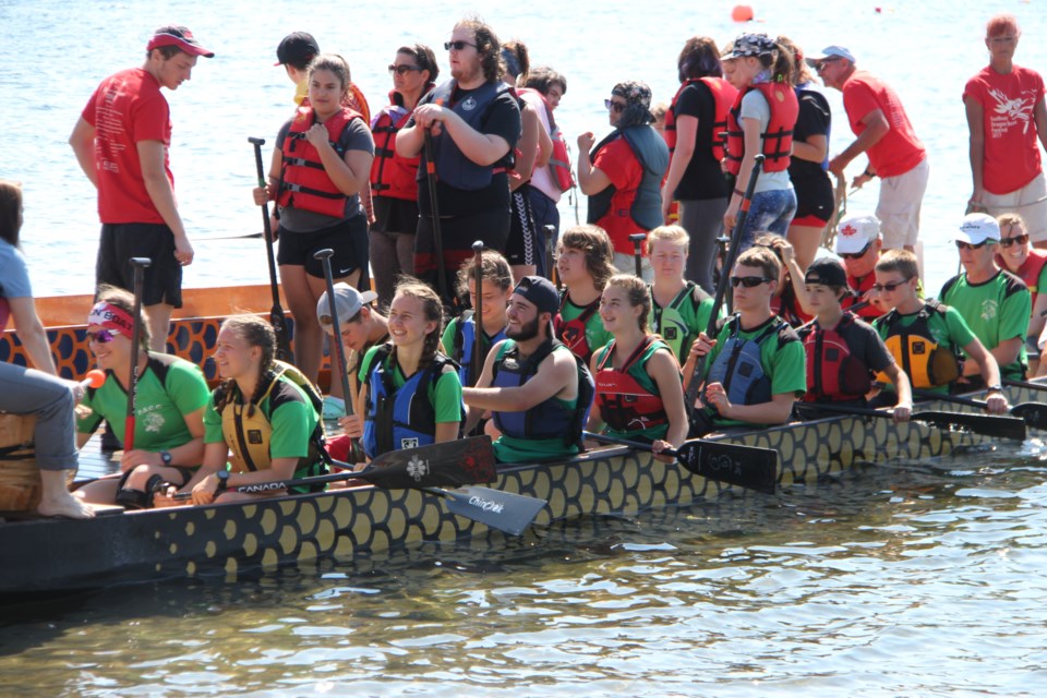 Ramsey Lake is alive with sweating paddlers, hollering drummers and intricately decorated watercraft today for the 18th annual Sudbury Dragon Boat Festival. (Photo: Matt Durnan)