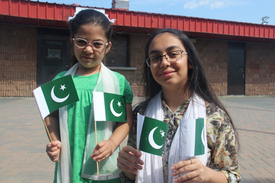 Sisters Aymen Saquib, 17, and Alishba Saquib, 6, were among those who attended a Pakistan Independence Day celebration in Greater Sudbury Aug. 14. (Heidi Ulrichsen/Sudbury.com)