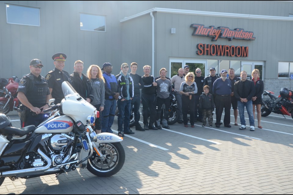 Motorcycle enthusiasts gathered at The Rock Harley-Davidson for Greater Sudbury's third Motorcycle Torch Ride on Aug. 26. (Photo: Arron Pickard)
