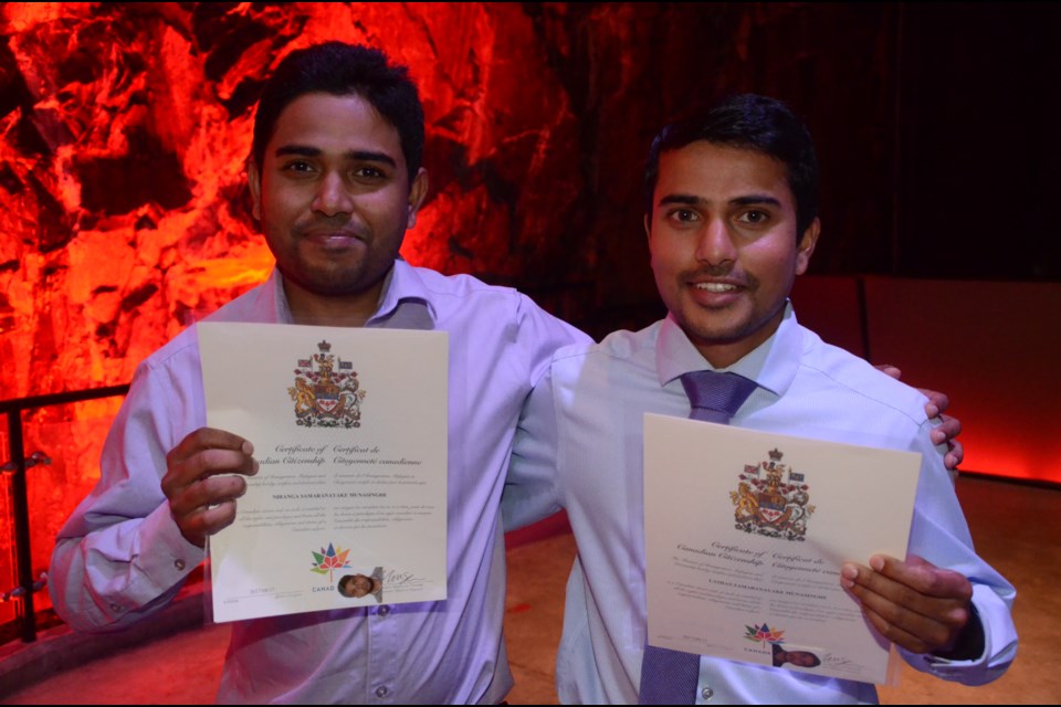 Brothers Nirangu Munasingh and Lashan Munasingh were among the 52 people from 24 countries sworn in Aug. 17 as Canada's newest citizens. (Arron Pickard/Sudbury.com)