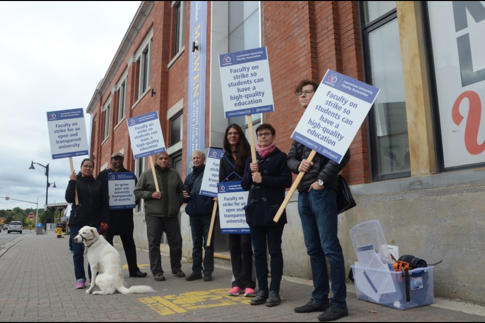 Members of the Laurentian University Faculty Union picket at the university's McEwen School of Architecture in downtown Sudbury Sept. 28. (Arron Pickard/Sudbury.com)