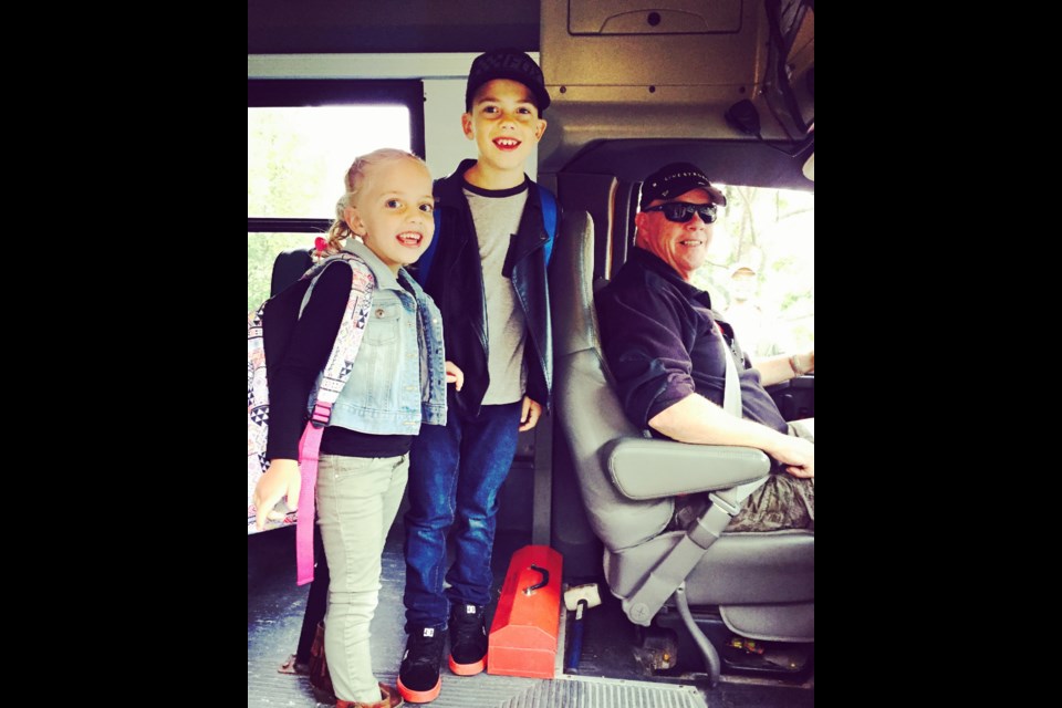 Colton savage - Grade 4 and Gabby Savage - SK. Jennifer Savage writes "They were so stoked for the first day! And our bus driver is amazing!! Kudos to all they do!"