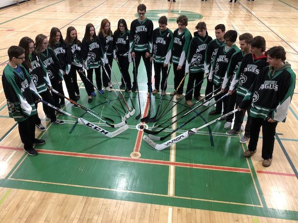 Staff and students from Conseil scolaire catholique du Nouvel-Ontario schools rallied behind the Humbolt Broncos on Thursday, April 12, wearing jerseys or green and yellow shirts to school. Many schools also placed hockey sticks outside their school in solidarity with all those who were affected by the tragedy in Saskatchewan.  (Supplied)