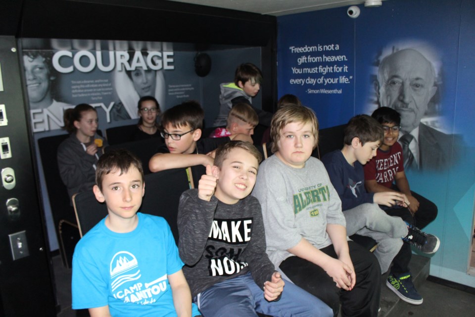 Students at MacLeod Public School climbed on to a bus on Tuesday, but not one that would take them to or from school. (Matt Durnan/Sudbury.com)