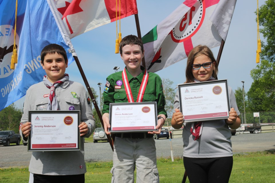Jeremy Anderson, Denis Anderson and Derika Russel were all presented with awards for their outstanding leadership at the Beaver Scout year-end celebration Saturday. (Sudbury.com/Gia Patil)