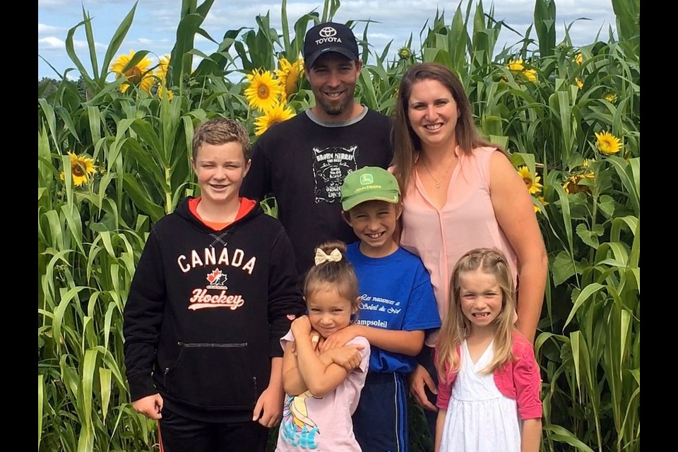 Dave and Chantal Lewington (pictured with their four children) are the owners of Dalew Farms in Lavigne. (Supplied)