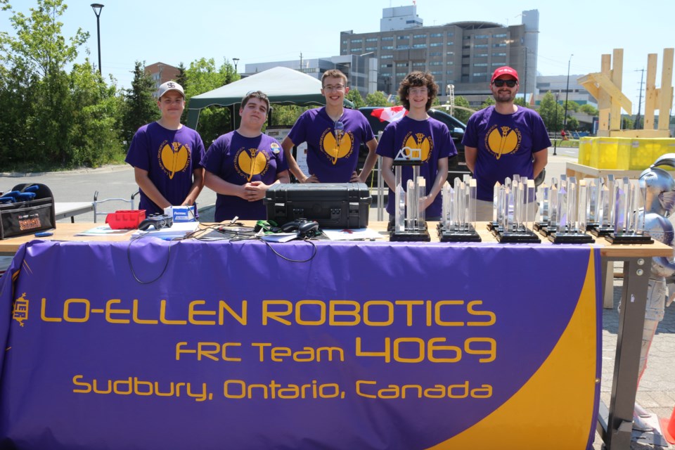 Members of the Robotics team -Dan Monti, Malcolm Gervais, Ernest Fedorowich, Rhys Kenwall, Stephen Irvine show off some of their cool tricks and trinkets. (Sudbury.com/Gia Patil)