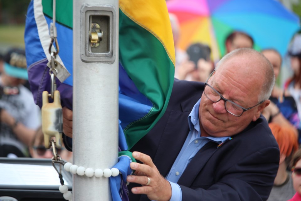 Greater Sudbury Mayor Brian Bigger raises the rainbow flag at James Jerome Sports Complex to mark the beginning of Pride Week on July 9, 2018. (Allana McDougall/Sudbury.com)
