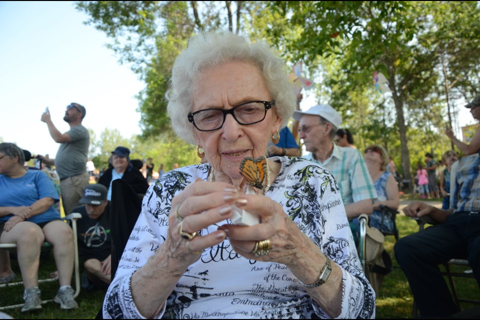 Jeannine Albert released three butterflies on Sunday in memory of her husband, Laurent, her brother in law, Pete Larose, and her niece, Lise Larose. (Arron Pickard/Sudbury.com)