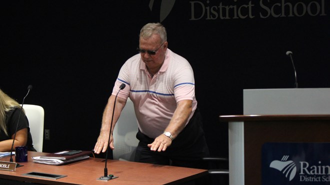 Rainbow District School Board trustee Larry Killens takes a seat at the board table on Aug. 28. (Matt Durnan/Sudbury.com)