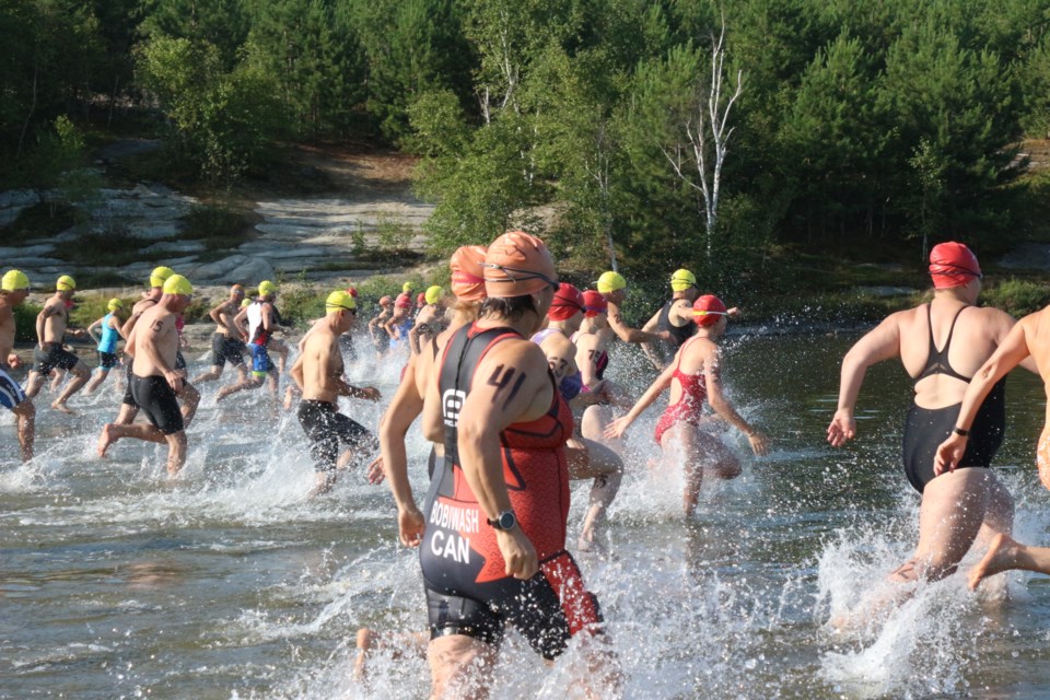 Swimmers kick started the annual Beaton Classic race at Moonlight Beach today. (Sudbury.com/Gia patil)