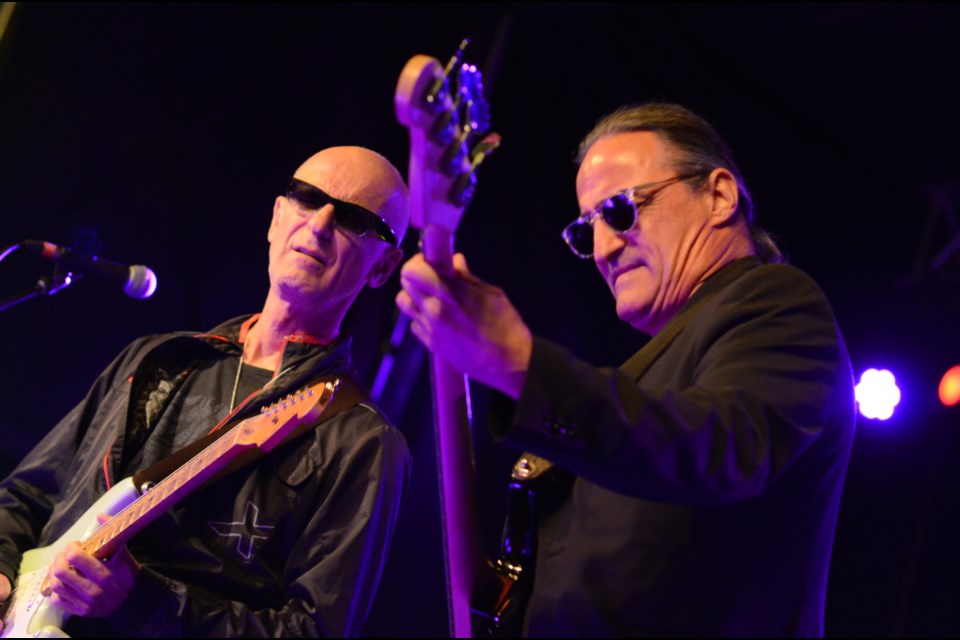 Kim Mitchell and bassist-vocalist Peter Fredette have been entertaining crowds together since 1983. Their chemistry was appreciated at the 43rd Valley East Days Rock Night concert on September 7, 2018. (Marg Seregelyi/Sudbury.com)