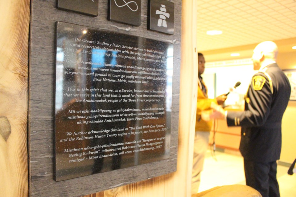 The inscription on the territory acknowledgment plaque can be read in Anishinaabemowin and English at GSPS headquarters on Nov. 2, 2018. (Allana McDougall/Sudbury.com) 