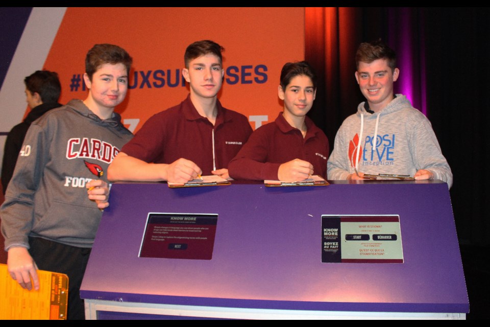 St. Charles students Ryan Scarpellini, Teegan Dumont, Alessio Capasso and Hayden MacDonald learned about opioid risks at the KNOW MORE Awareness Tour on December 4, 2018. (Allana McDougall/Sudbury.com)