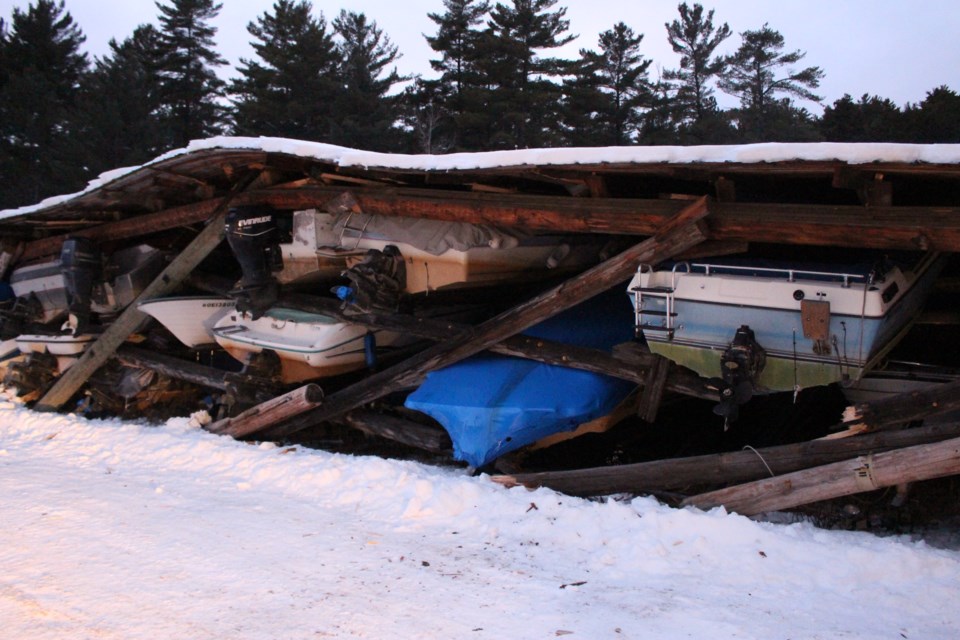 A wooden structure at the Penage Bay Marina in Whitefish collapsed late last week, destroying or damaging the several dozen boats stored there. (Matt Durnan/Sudbury.com)