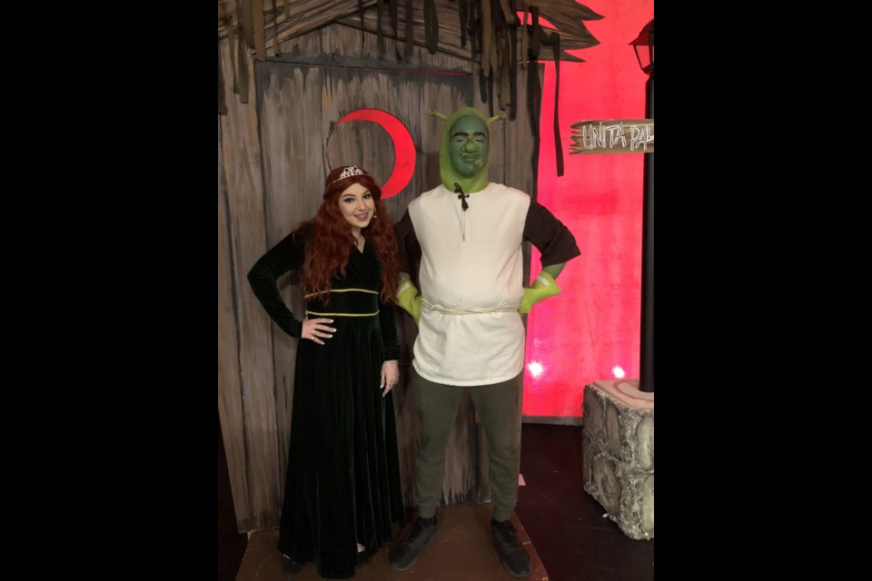 Trinity Thibeault (left) and Ryan Vendette dressed up in their Shrek and Fiona costumes