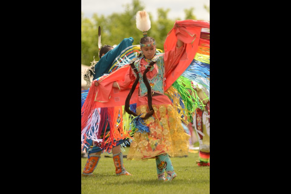 Avery Sutherland looks fierce as she dances during National Indigenous Peoples Day at Bell Park. (Arron Pickard/Sudbury.com)