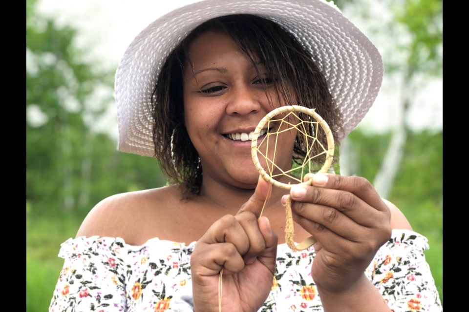 Raven Simpson with the Indigenous Environmental Keepers program held a dream catcher workshop during a celebration of National Indigenous Peoples Day at Wild At Heart June 21. (Heather Green-Oliver/Sudbury.com)
