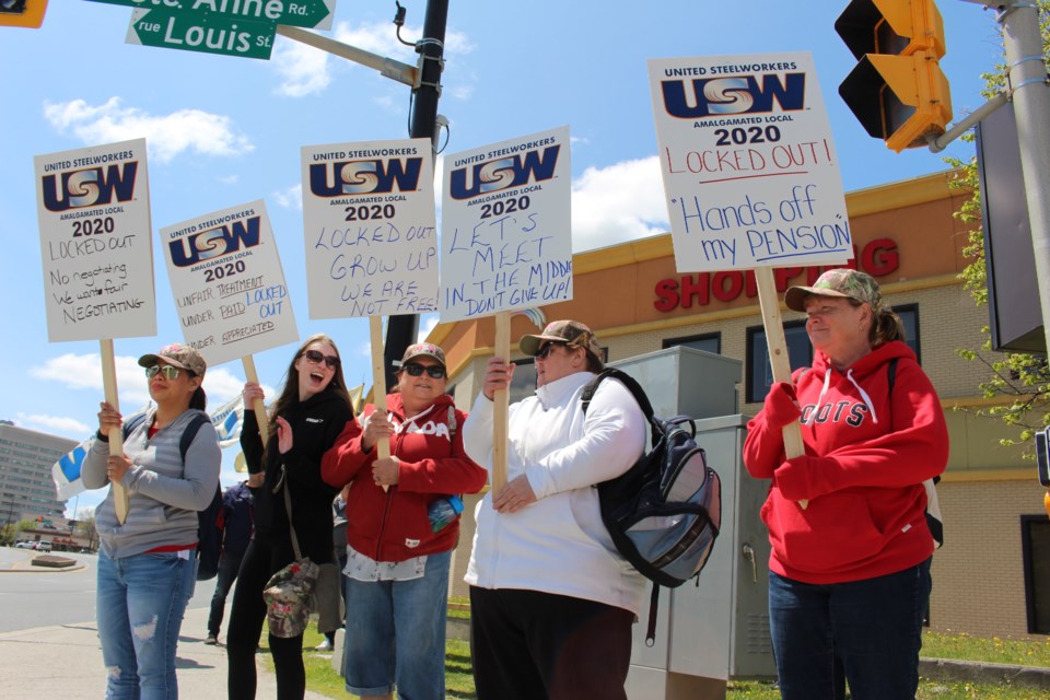 Roughly two dozen people picketed Monday after CarePartners Sudbury employees were locked out of their office on May 31. (Matt Durnan/Sudbury.com)