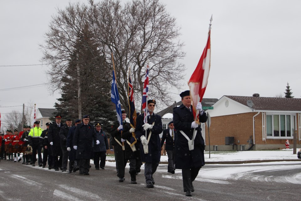 With heads bowed and arms at their side, residents marched down the snowy streets of Chelmsford Saturday, as part of the community's annual Remembrance Day Ceremony. (Keira Ferguson/Sudbury.com)