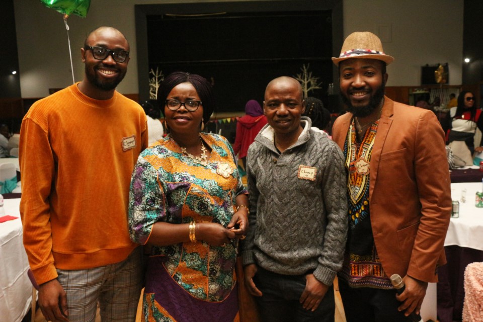 (From the left) Daniel Akinyemi, Bukola, Adejare Muniru Oduwole and David Onalo at the Sudbury Events Centre for the Nigerian community's End of the Year Party. (Keira Ferguson/ Sudbury.com)