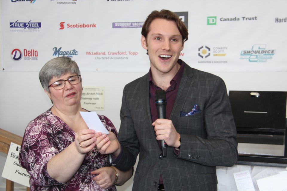 CTV's Will Aiello, seen here with Canadian Hard of Hearing Association Sudbury branch executive director Kim Scott, had the honour of drawing the first prize winning ticket in this year's “The Ultimate Dream Home” draw. (Heidi Ulrichsen/Sudbury.com)