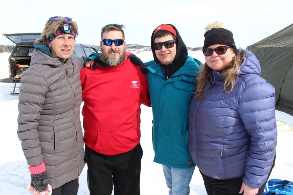(From the left) Retired GSPS Sgt. Joanne Pendrak, special olympian William Lang, special olympian Matthew Bouillon and Heather Lewis, at Sudbury's 7th annual Polar Plunge in support of Special Olympics Ontario. (Keira Ferguson/ Sudbury.com)