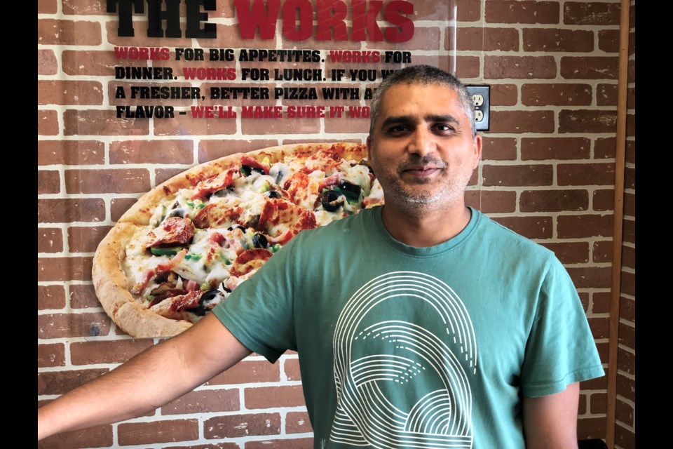 Local business owner Muhammad Afzal opens Ontario's first Papa Murphy's pizza restaurant inside the former Maria's Restaurant in the Flour Mill. (Heather Green-Oliver/Sudbury.com)