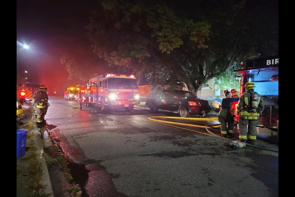 Career fire crews from New Sudbury, Minnow Lake and Downtown are seen responding to a structure fire off of Auger Avenue at approximately 1 a.m. Monday.