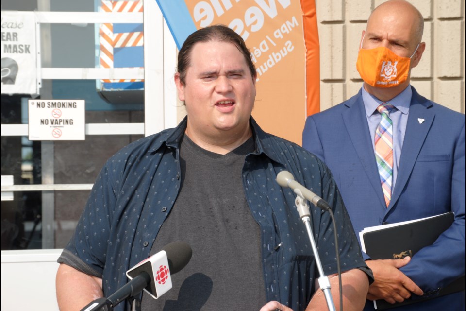 Jak’s Diner owner Chris Cunningham speaks during a media event outside his Sudbury restaurant on Tuesday, as Sudbury NDP MPP Jamie West looks on.     
