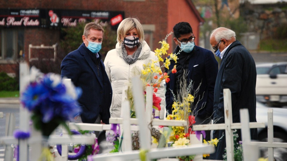 Ontario Medical Association CEO Allan O’Dette, president Dr. Adam Kassam, Crosses for Change founder Denise Sandul and Sudbury and District Medical Association president Dr. Rayudu Koka tour the Crosses for Change site earlier today. 