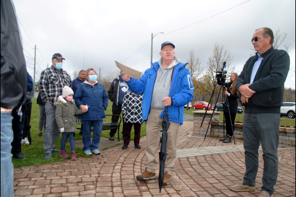 Ward 5 Coun. Robert Kirwan speaks during a meeting with residents of the Lorraine Street area at Constable Joseph MacDonald Park on Sunday as Ward 11 Coun. Bill Leduc looks on.         