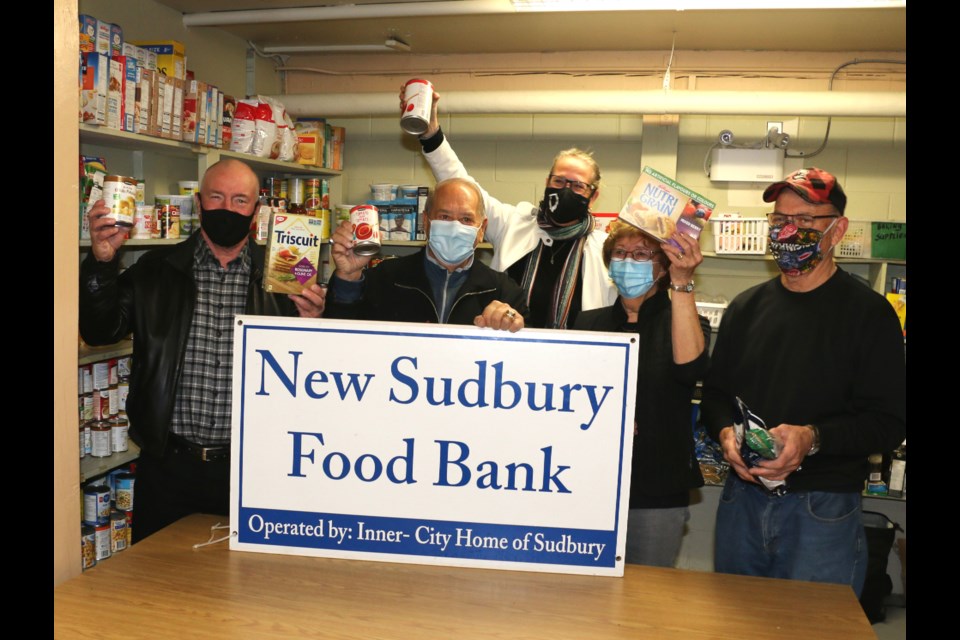  The New Sudbury food bank is back in operation for the hundreds of families in need along the Lasalle Boulevard corridor. Several Inner-City Home board members took part in the reopening event held on Tuesday including from left, treasurer Jesse Winters, president Joe Drago, executive director Jennifer Grooms and food bank volunteers Judy Gray and Homer Carr. The location continues to be at 1169 Dollard Avenue (back door behind the dance school). 