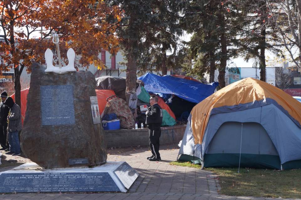 101121_JL_Bylaw_cleanup_tent_cenotaph_memorial