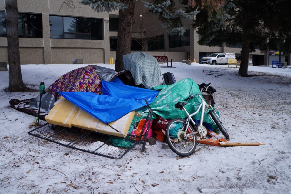 The Memorial Park encampment is seen being dismantled earlier this year.
