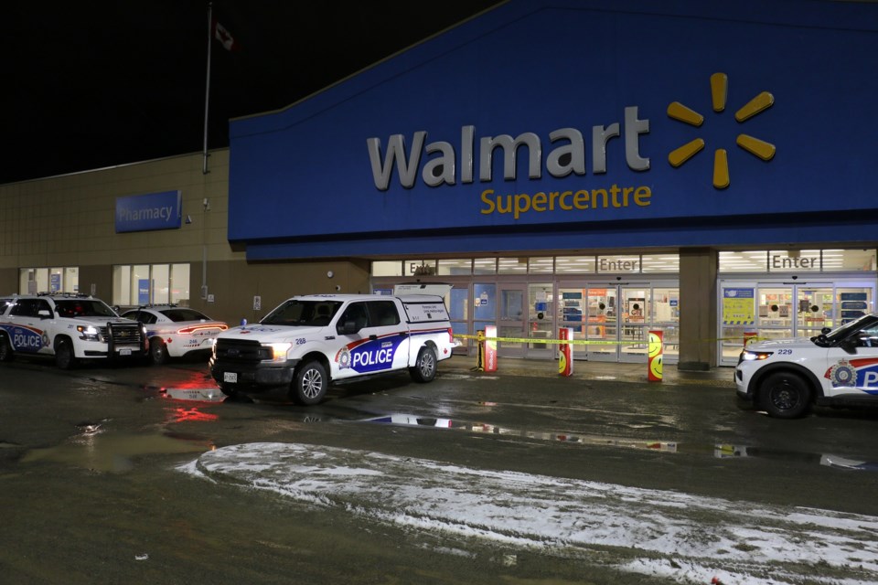 Police cruisers are seen at Sudbury’s Walmart on Lasalle Boulevard at approximately 11 p.m. investigating a firearms incident in which they report a 20-year-old man was shot.
