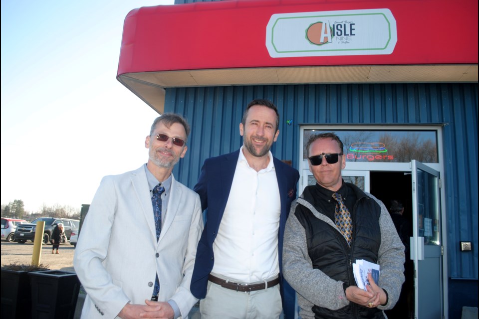 Ontario Party Leader Derek Sloan, centre, is seen with candidates Willy Schneider (left) and Jason LaFace (right) outside of Aisle Nine Gourmet Burgers & Poutine in Sudbury on Friday night prior to a political meet and greet event.     