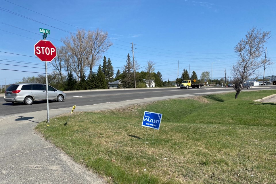 A campaign sign for Nickel Belt Progressive Conservative candidate Randy Hazlett is seen on municipal property in Val Therese, which is in breach of a city bylaw.