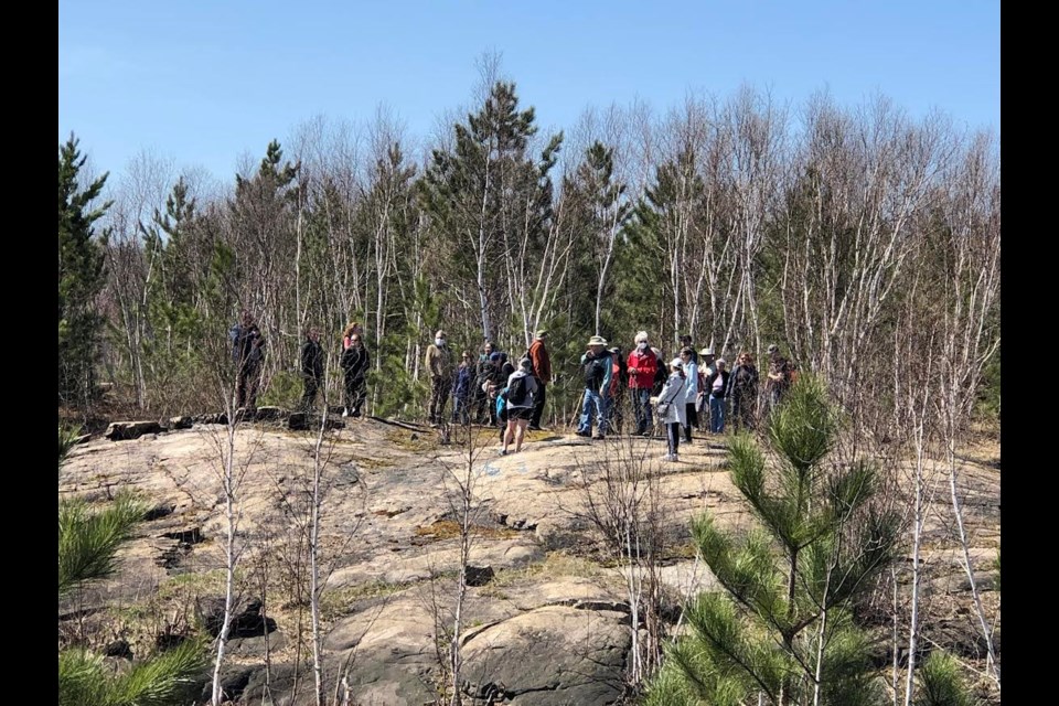 Candidates and community members take part in a nature walk to learn about the unique Bennett Lake watershed in the Laurentian University greenspace, which was led by reclamation, restoration and wetland ecology professor Peter Beckett on May 7.