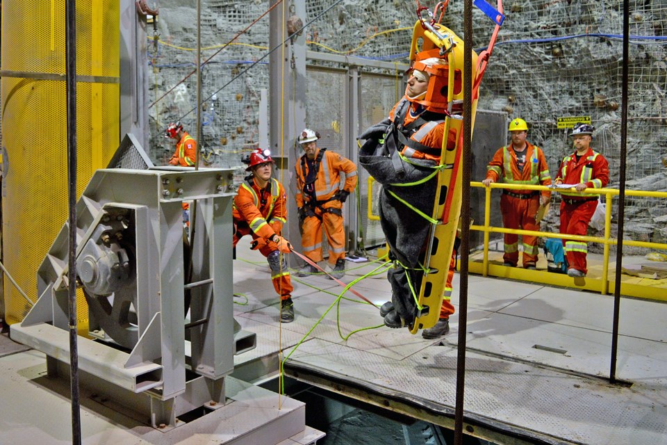 Mine Rescuers practicing rope rescue work with a patient.