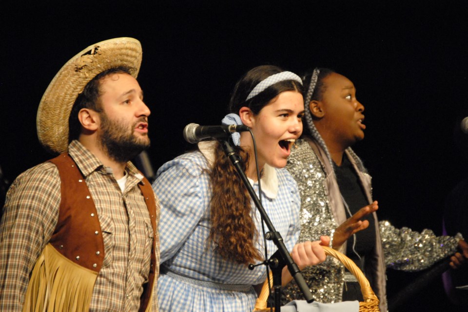 Scarecrow (Alessandro Costanini), Dorothy (Maryn Tarini) and Tinman (Elsa Simbagoye) sing a song during a dress rehearsal for YES Theatre’s orchestral production of The Wizard Of Oz at the Sudbury Theatre Centre on Thursday.