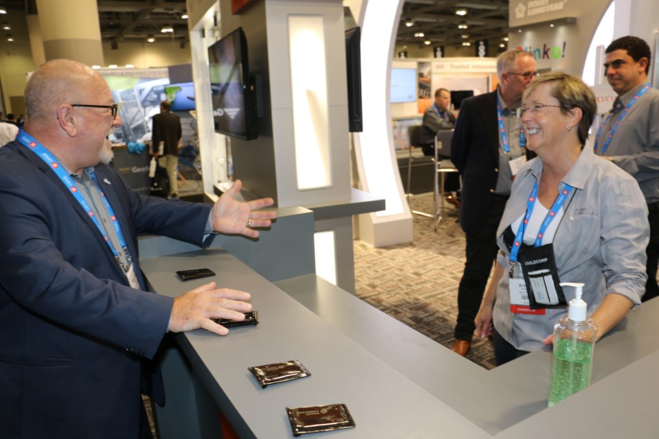 Greater Sudbury Mayor Brian Bigger (left) chatted with Brenda Hassard of North Bay's Boart Longyear while at the prospector's annual convention in Toronto in June. 