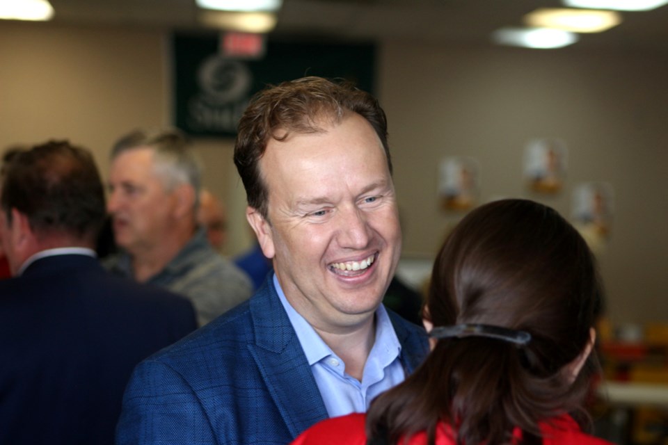 Greater Sudbury mayoral candidate Paul Lefebvre mingles with supporters during the grand opening of his campaign office this morning. 