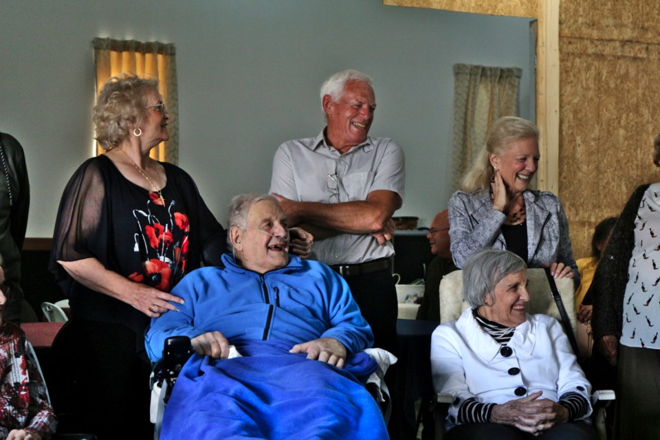Simard siblings share a laugh during Sunday’s reunion. Back row from left is Monique, Henri-Paul and Lise. Front row from left is Roger and Denise. 