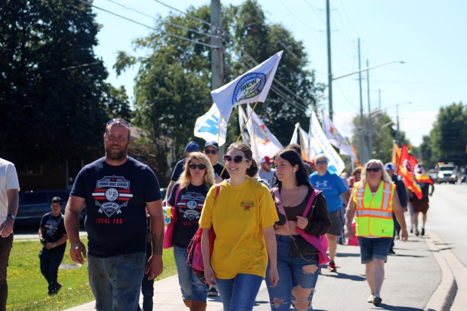 Participants march during Labour Day festivities hosted by the Sudbury & District Labour Council at Morel Family Foundation Park.
