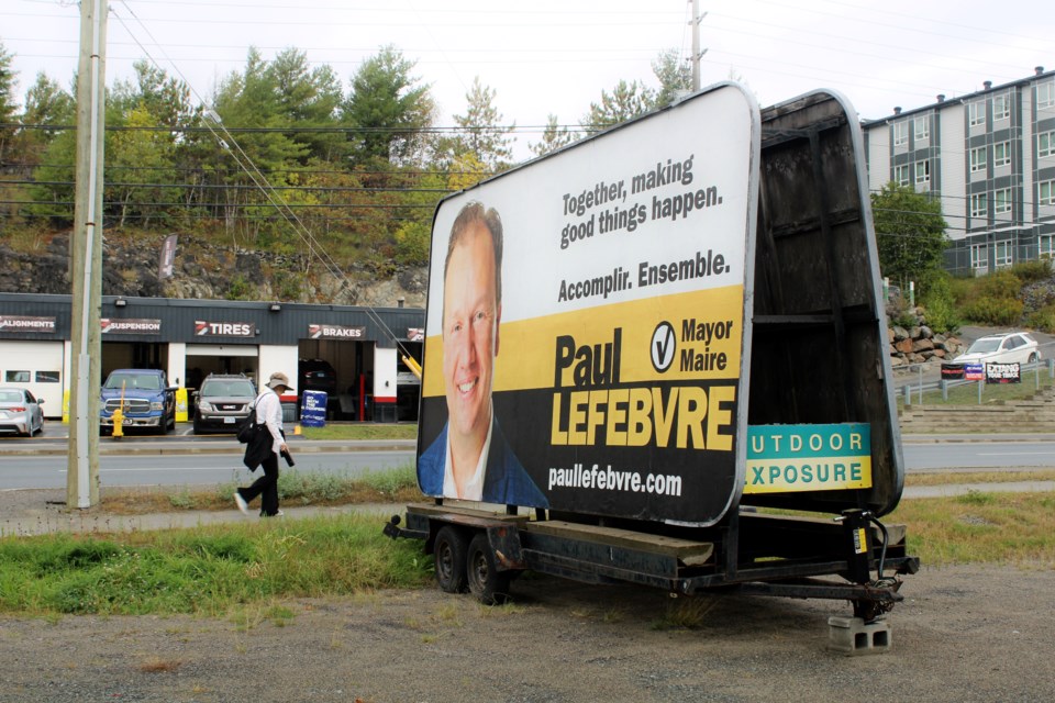 The same sign trailer mayoral candidate Paul Lefebvre was asked by the city to remove is seen outside of Marc Despatie’s campaign office earlier this year during the provincial election.