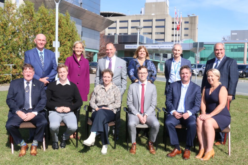 Members of the Fielding Purdue family (seated) at Health Sciences North on Monday along with HSN officials (Len Gillis / Sudbury.Com )